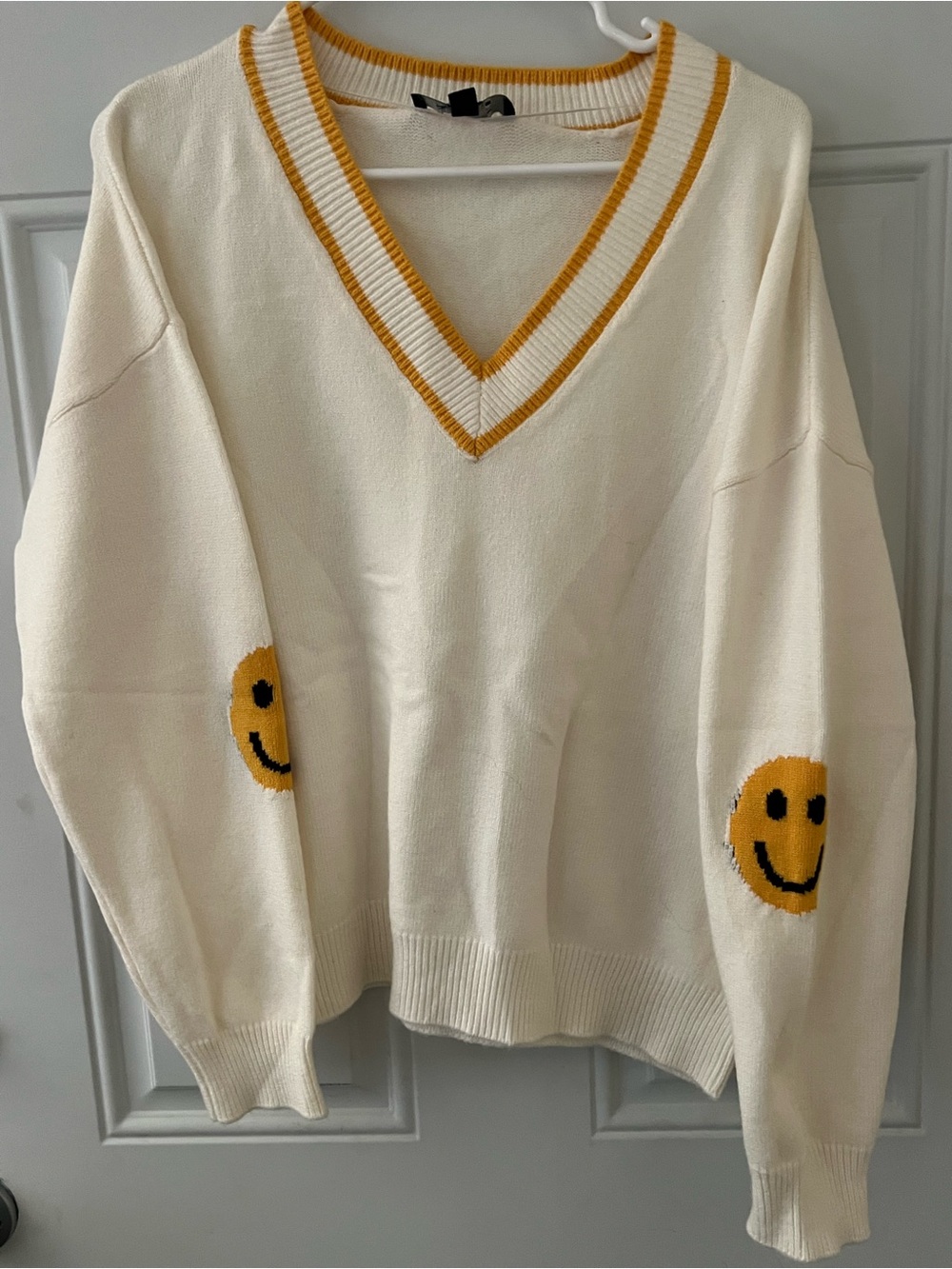 Cream V-Neck Sweater with Yellow Smile Accents